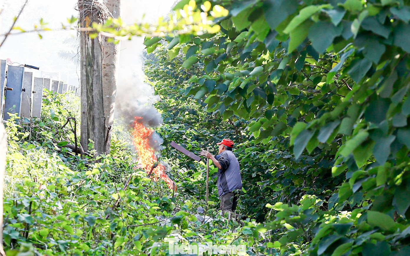 Hà Nội "chìm nghỉm" trong ô nhiễm không khí- Ảnh 13.