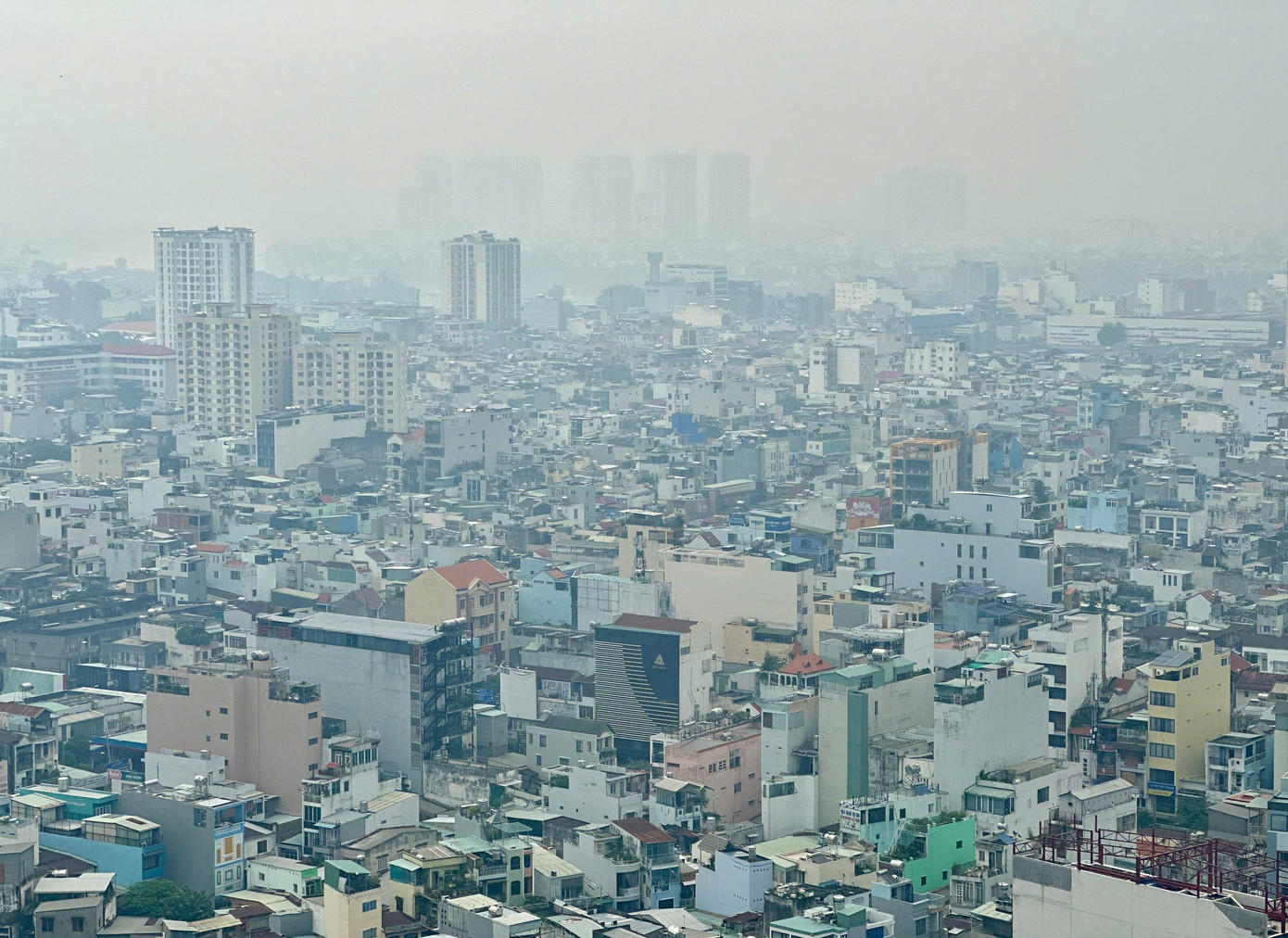 Bầu trời TPHCM đục ngầu, nồng độ bụi mịn vượt ngưỡng nhiều lần- Ảnh 7.