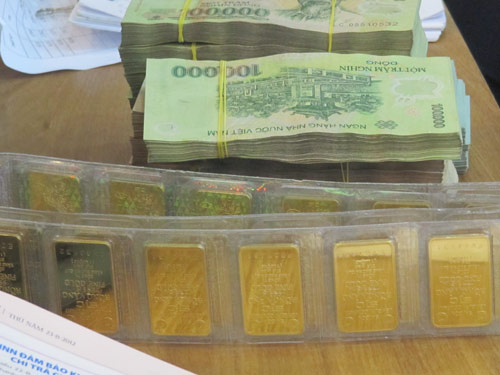 Tối 16-12, giá vàng tiếp tục giảm sâu- Ảnh 1. Tối 16-12, giá vàng tiếp tục giảm sâu- Ảnh 1.