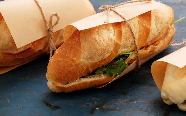 B&aacute;nh m&igrave; Việt Nam: Từ m&oacute;n ăn đường phố đến biểu tượng ẩm thực thế giới- Ảnh 1.