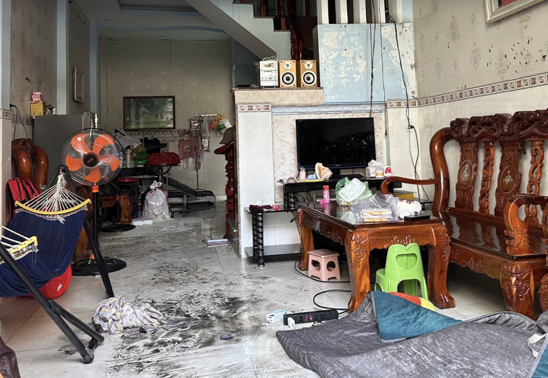 Cháy nhà ở TP.HCM khiến bé gái 8 tuổi tử vong, 3 người bị thương- Ảnh 2.