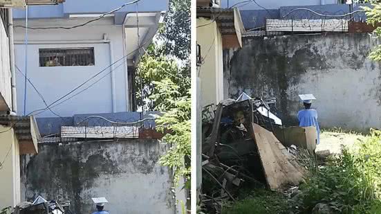 B&eacute; g&aacute;i 5 tuổi mặc &aacute;o tốt nghiệp đứng trước song sắt nh&agrave; t&ugrave; vẫy tay v&agrave; c&acirc;u chuyện &aacute;m ảnh ph&iacute;a sau- Ảnh 1.