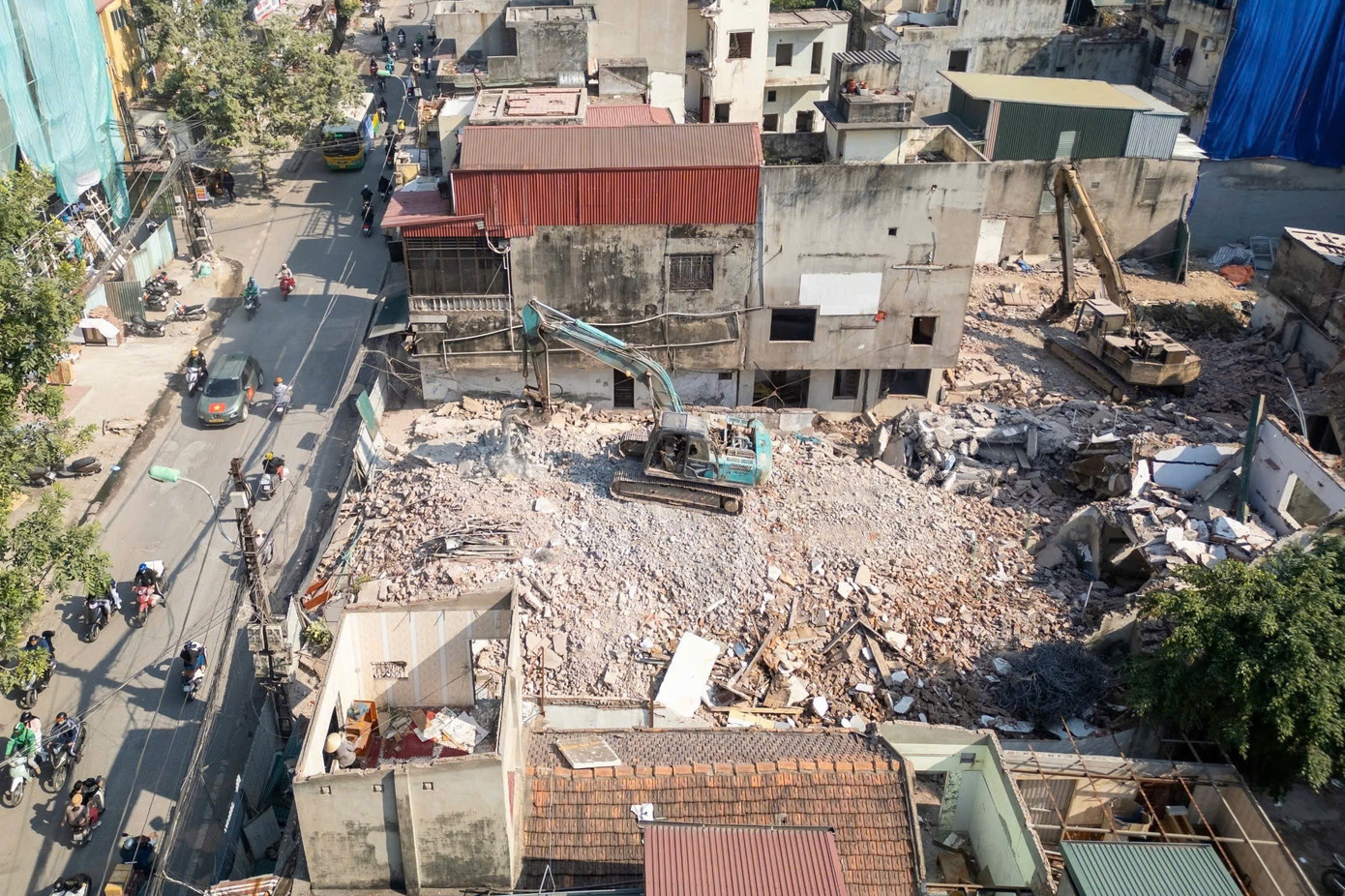 Người dân bám trụ, kinh doanh giữa dự án đường “đắt nhất hành tinh”- Ảnh 17.