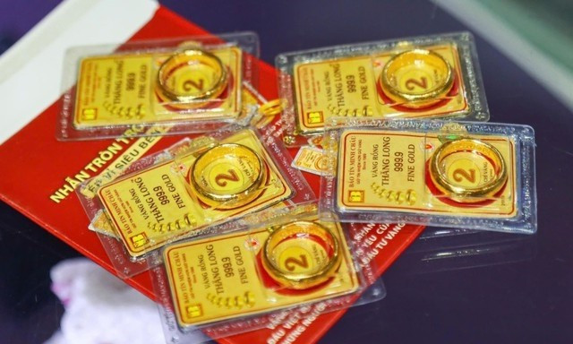 Giá vàng nhẫn tiếp tục giảm- Ảnh 1.