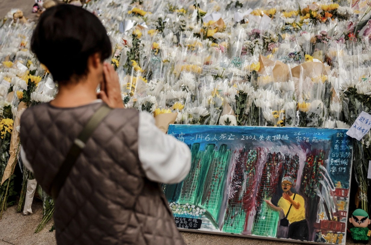 Bức ảnh người đàn ông gào thét vì vợ mắc kẹt trong đám cháy trở thành biểu tượng ám ảnh của vụ thảm họa 159 người chết- Ảnh 8.