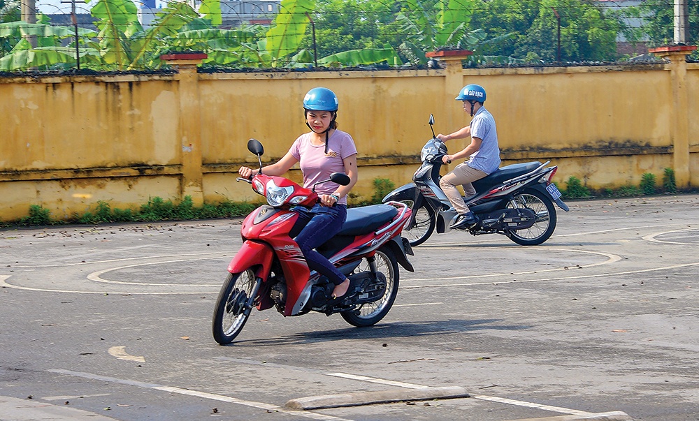 Người có bằng lái ô tô được miễn thi lý thuyết 2 loại bằng lái xe máy- Ảnh 1.