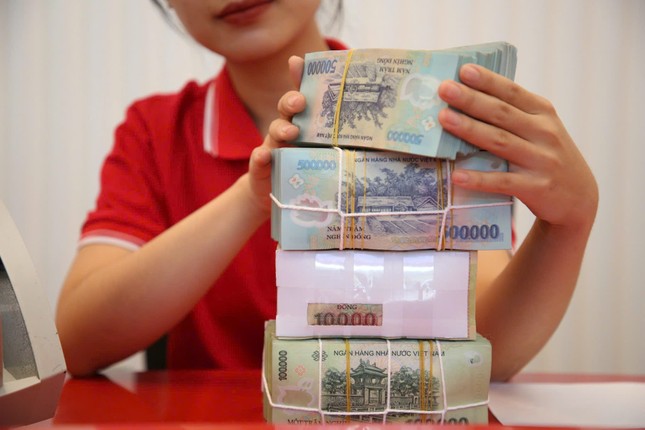 Lãi suất huy động tiếp đà giảm- Ảnh 1.