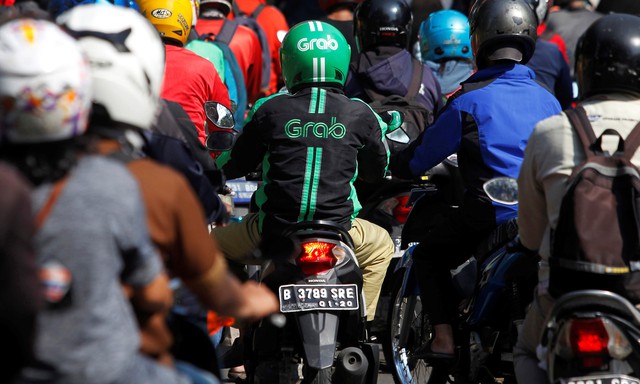 Chạy Grab, Gojek được 200k/ngày mà mỗi cuốc xe bị "cắt máu" đến 20%: Làm nghề này ở đây là khổ hay sướng?- Ảnh 4.