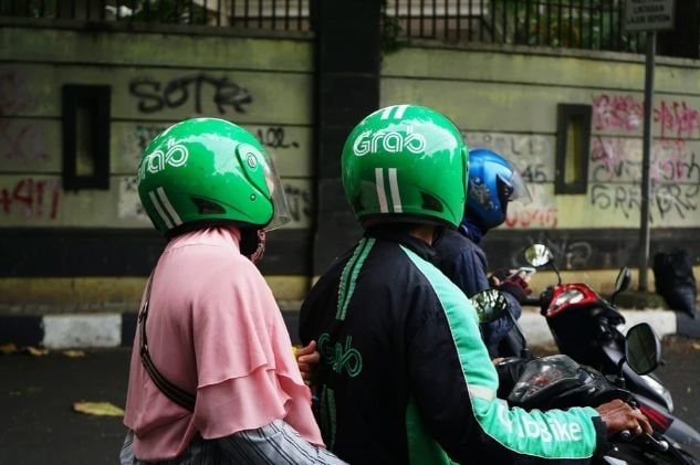 Nóng: Grab sắp thâu tóm Gojek ngay trong năm nay- Ảnh 1.