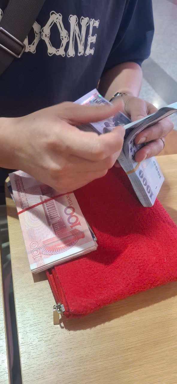 Hành trình của chiếc ba lô đựng gần 100.000 nhân dân tệ trong đêm ở Nội Bài- Ảnh 2.