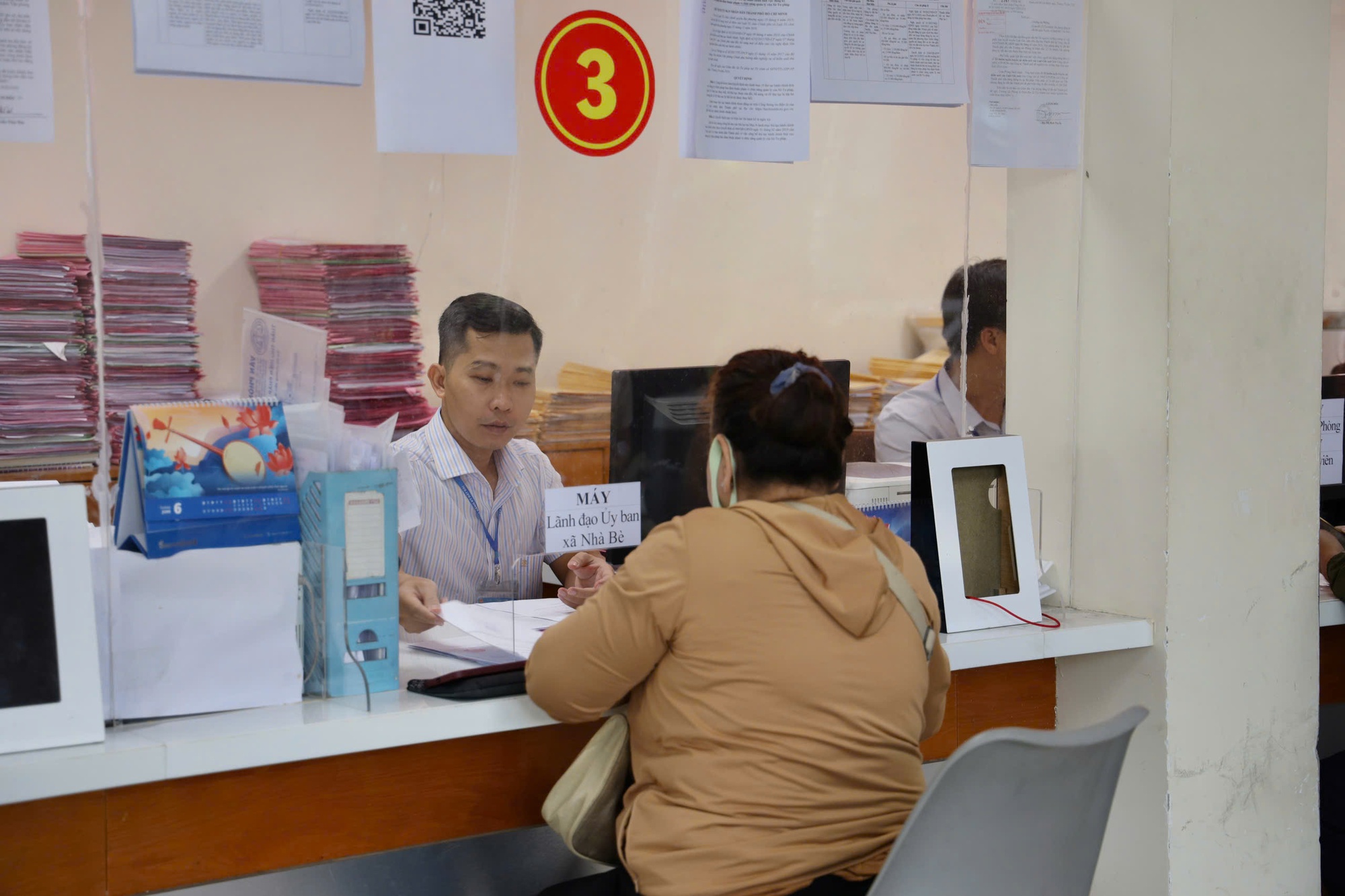 Những ngày cuối cùng của cấp huyện ở TP HCM- Ảnh 2.
