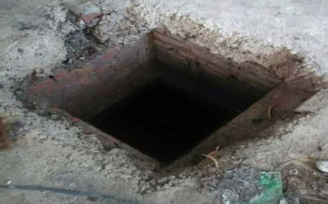 Người qua đường nhảy xuống cứu 3 công nhân ngạt thở dưới bể phốt, cả 4 đều tử vong- Ảnh 1.