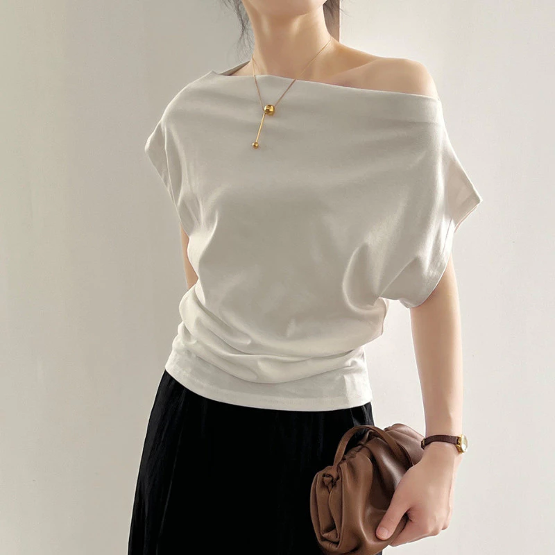 2 kiểu áo hot nhất hè này: Giá chưa đến 100k mà giúp vóc dáng thon thả hơn khi diện- Ảnh 2.