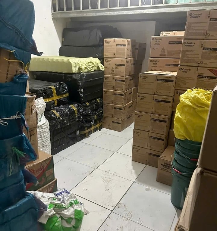 Phá đường dây sản xuất nhớt giả, thu lợi bất chính hàng chục tỷ đồng ở TP.HCM- Ảnh 2.