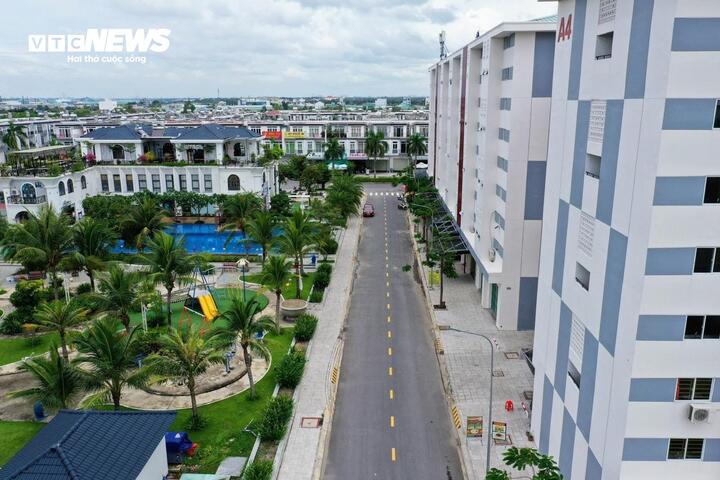 Quy định thu nhập dưới 15 triệu đồng/tháng khiến nhiều người khó mua nhà xã hội- Ảnh 1.