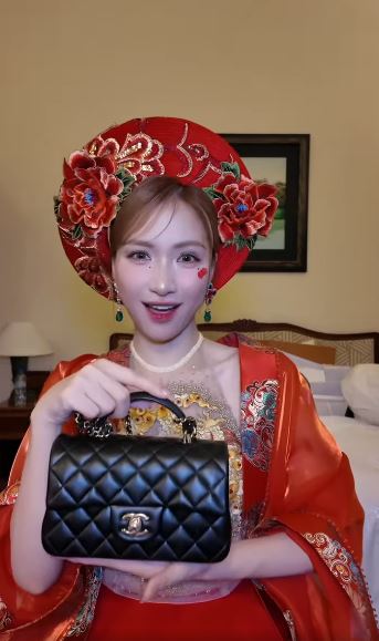 Hòa Minzy đáp trả thế nào khi bị nói lợi dụng Văn Toàn mua túi hiệu đắt đỏ?- Ảnh 1.