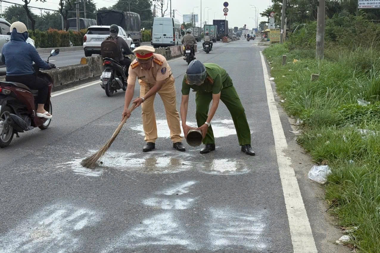 Đã tìm ra người phun sơn dòng chữ "bắn tốc độ"- Ảnh 2.