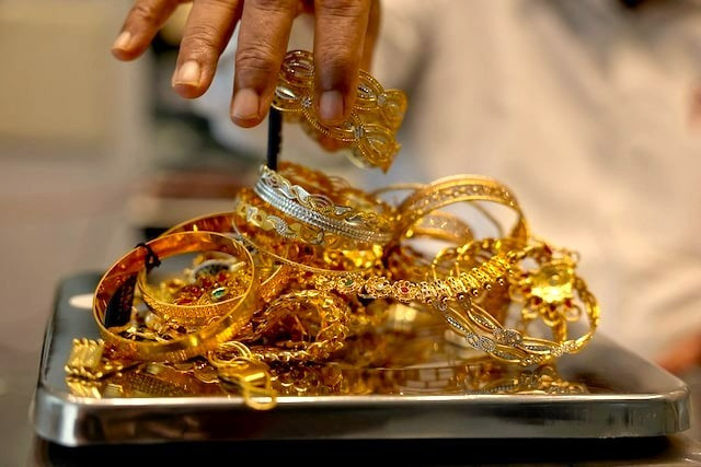Dấu hiệu thận trọng về giá vàng, cổ phiếu- Ảnh 1.