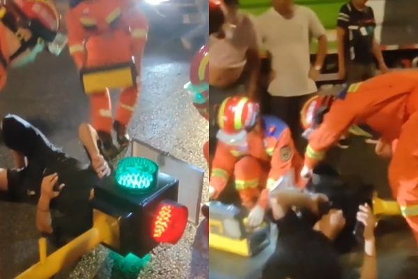 Hy hữu: Người đi xe máy kẹt đầu vào cột đèn giao thông- Ảnh 1. Hy hữu: Người đi xe máy kẹt đầu vào cột đèn giao thông- Ảnh 1.