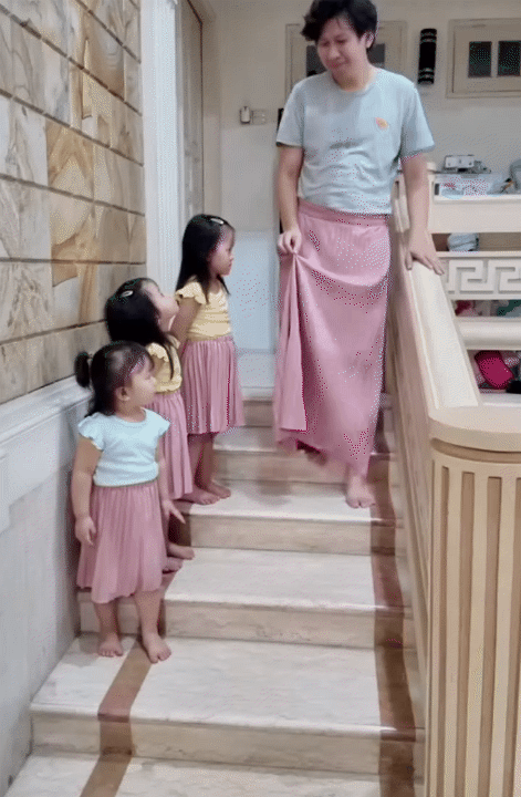 Ông bố trẻ chuyên mặc váy, dạy 3 "gái rượu" cách đi đứng nói cười duyên dáng: Loạt clip triệu view khiến dân mạng tan chảy- Ảnh 2.