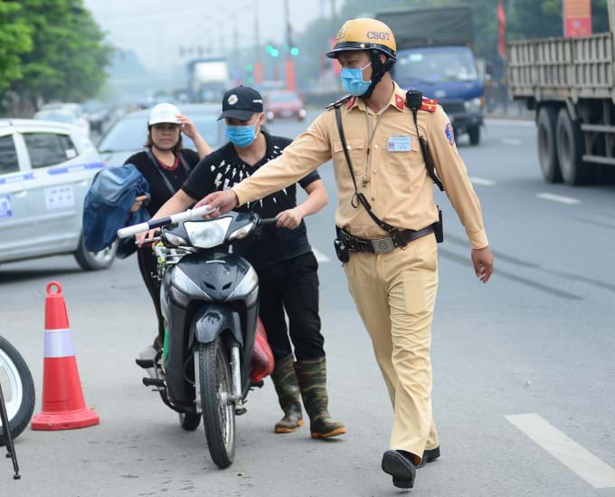 Lưu ý: 4 rủi ro pháp lý có thể gặp khi chây ì nộp phạt vi phạm giao thông- Ảnh 1.
