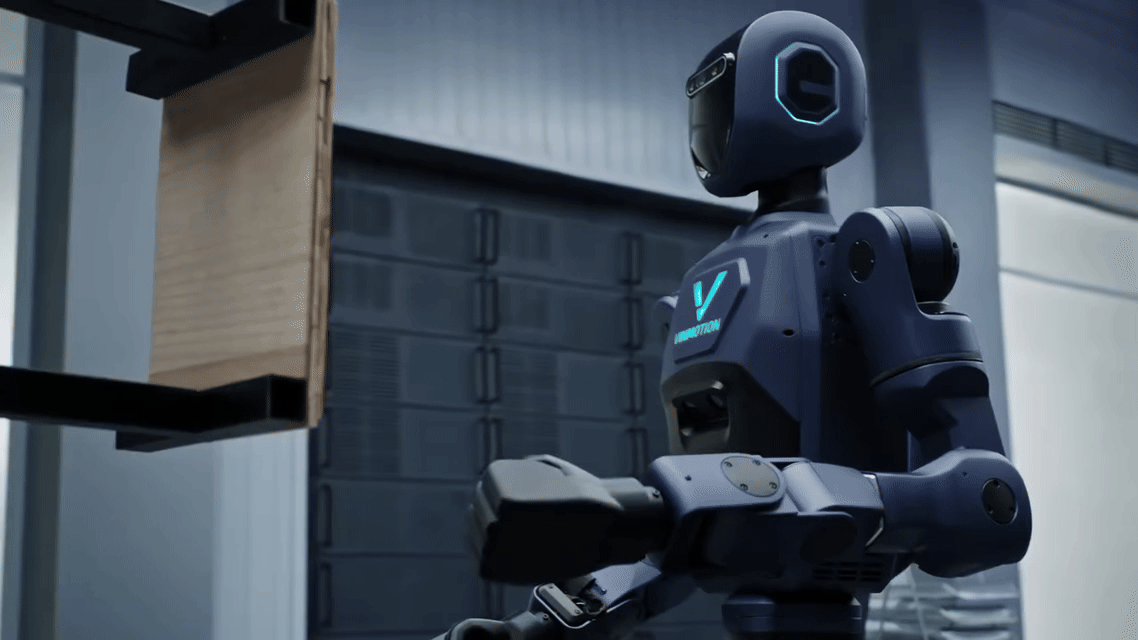 Robot hình người 'Made in Vietnam' thế hệ thứ 2 của tỷ phú Phạm Nhật Vượng chính thức ra mắt: Có thể tự sạc pin - không cần con người hỗ trợ- Ảnh 2. Robot hình người 'Made in Vietnam' thế hệ thứ 2 của tỷ phú Phạm Nhật Vượng chính thức ra mắt: Có thể tự sạc pin - không cần con người hỗ trợ- Ảnh 2.