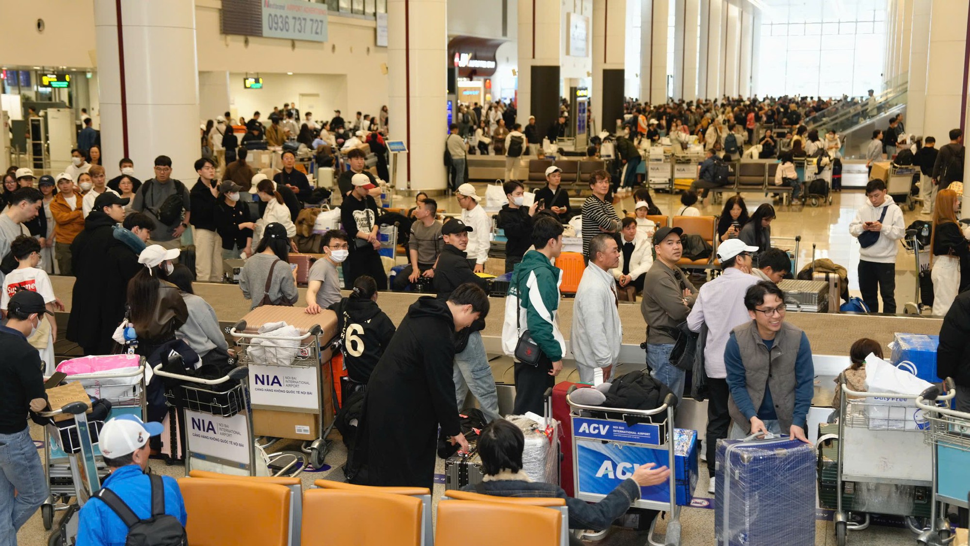 S&acirc;n bay Nội B&agrave;i lập kỷ lục đ&oacute;n hơn 124.000 lượt kh&aacute;ch ng&agrave;y m&ugrave;ng 6 Tết- Ảnh 4.