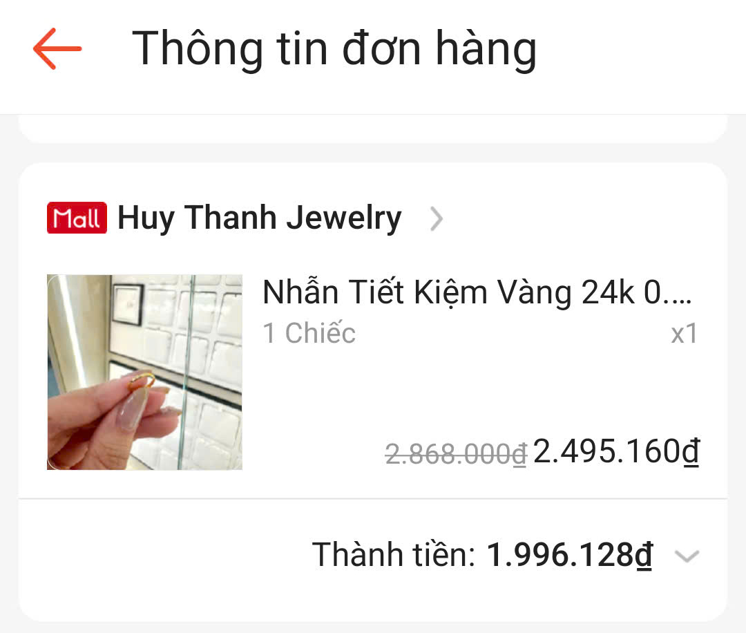 Không xếp hàng ngày vía Thần Tài, nhiều người chọn mua vàng theo cách này- Ảnh 1.