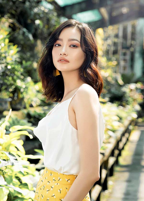 Hoa hậu Việt đầu ti&ecirc;n lọt top 100 gương mặt đẹp nhất thế giới: Nhan sắc khuynh đảo Vbiz, qu&aacute; khứ l&agrave;m ca sĩ bị ch&ecirc; thậm tệ- Ảnh 3.