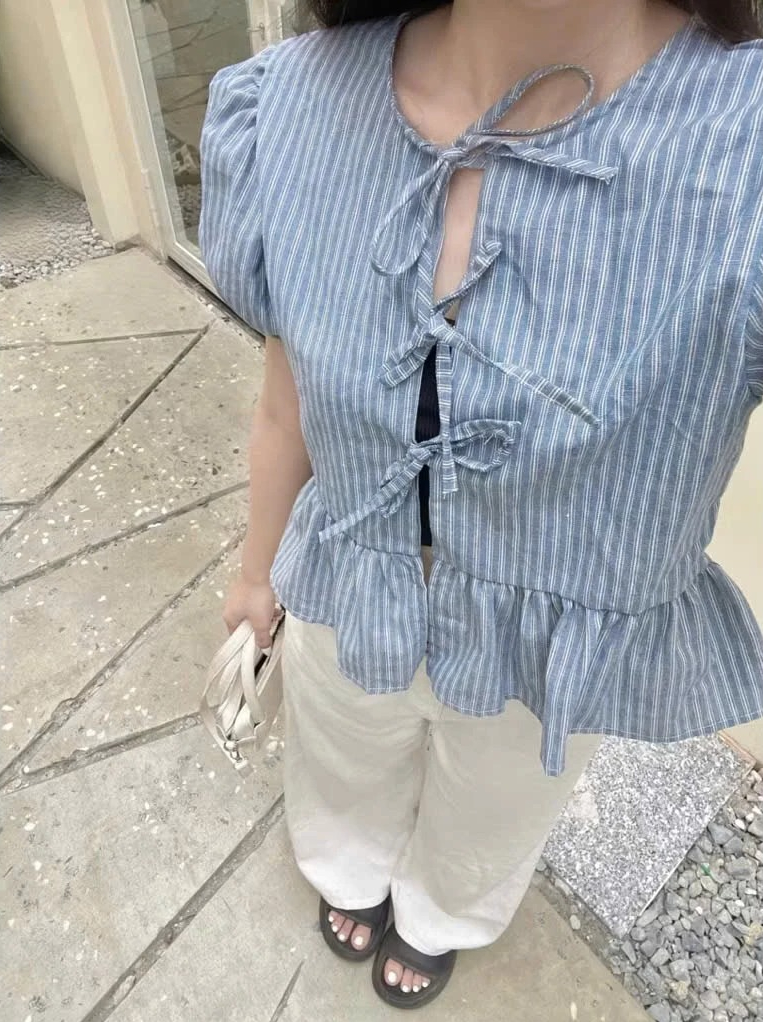 Hội mặc đẹp nhất thế giới b&igrave;nh chọn: Đ&acirc;y l&agrave; chiếc &aacute;o s&agrave;nh điệu nhất để mặc c&ugrave;ng quần jeans- Ảnh 6.