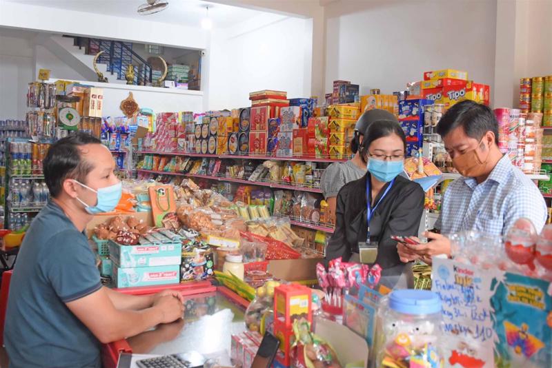 Hộ kinh doanh băn khoăn về ngưỡng thuế GTGT: Kiếm th&ecirc;m 5% nhưng tiền thuế c&oacute; thể tăng th&ecirc;m tới 50 triệu - Ảnh 1.