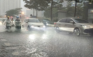 Miền Bắc li&ecirc;n tiếp đ&oacute;n kh&ocirc;ng kh&iacute; lạnh tr&agrave;n về, nhiệt độ giảm nhanh, mưa d&ocirc;ng sầm sập- Ảnh 2.