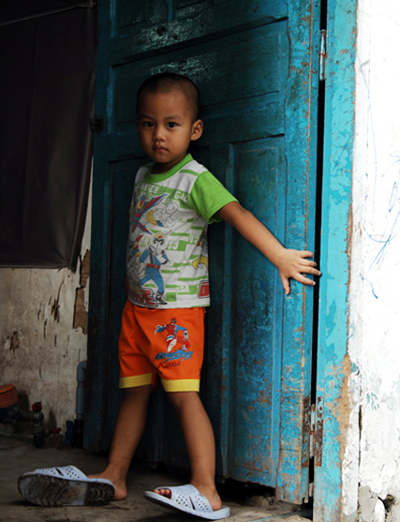 Cuộc sống trong khu "ổ chuột" ở Sài Gòn 7