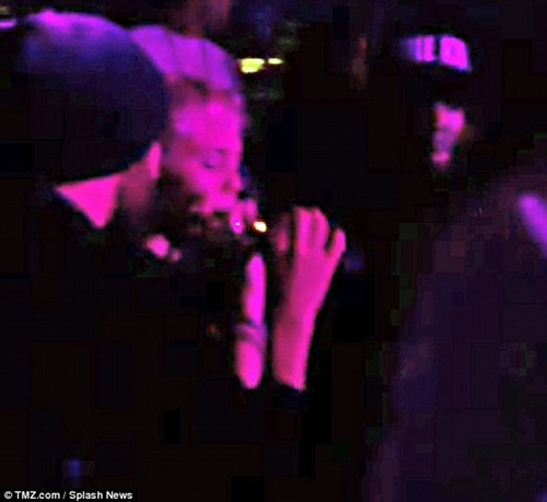 Miley was caught smoking marijuana at a nightclub 3