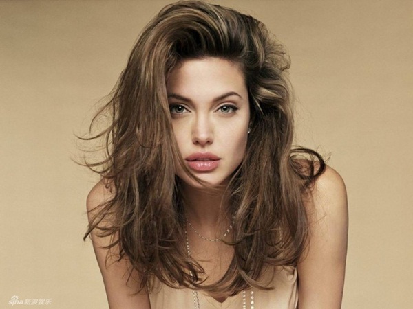 See a series of photos from childhood to adulthood of Angelina Jolie 15
