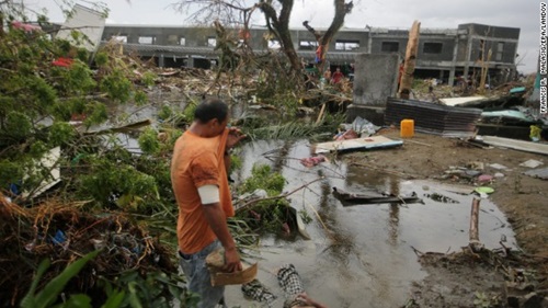 Chùm ảnh: Những thi thể nằm la liệt gây ám ảnh trong siêu bão Haiyan  5