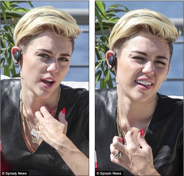 Miley Cyrus l&egrave; lưỡi kh&oacute; chịu v&igrave; mặc v&aacute;y da giữa trời n&oacute;ng 2