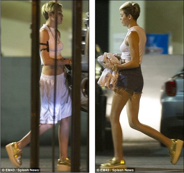 Miley Cyrus dán băng trên tay rời tiệm xăm mình 4