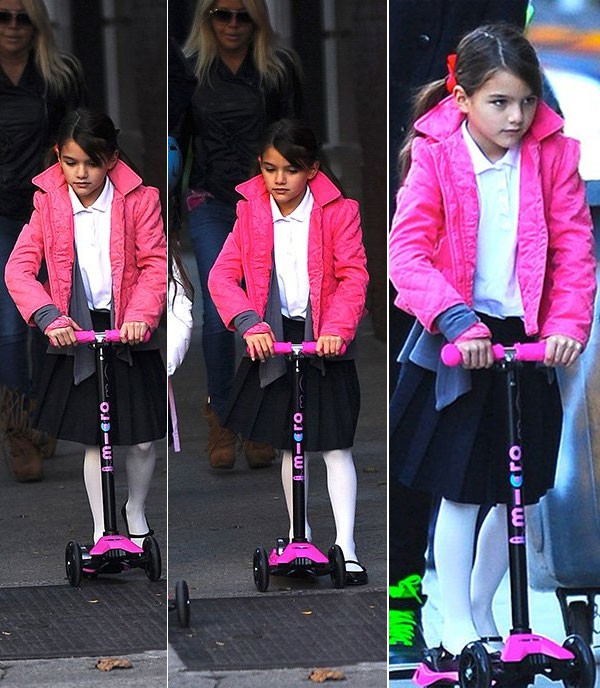 Bé Suri Cruise thích thú khi thấy cún con dễ thương 11