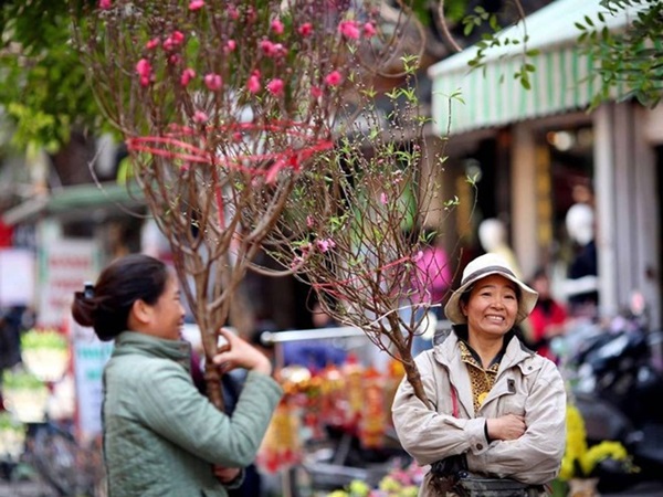 Không khí đón Tết Việt rộn ràng trên báo nước ngoài 10