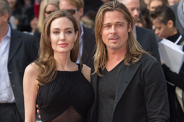 Brad Pitt mời Beckham dạy đá bóng cho các con 1