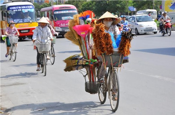 Chùm ảnh: Những chiếc xe đạp cũ "gánh gồng" mưu sinh giữa phố phường Hà Nội 10