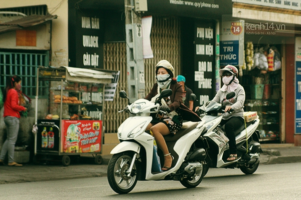 Chùm ảnh: Sài Gòn lạnh như mùa đông Hà Nội, người dân co ro xuống phố 7