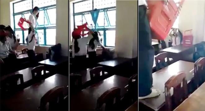 Nhóm học sinh dùng ghế đánh em P. khi P. bị dồn vào góc tường - Ảnh cắt từ video clip.