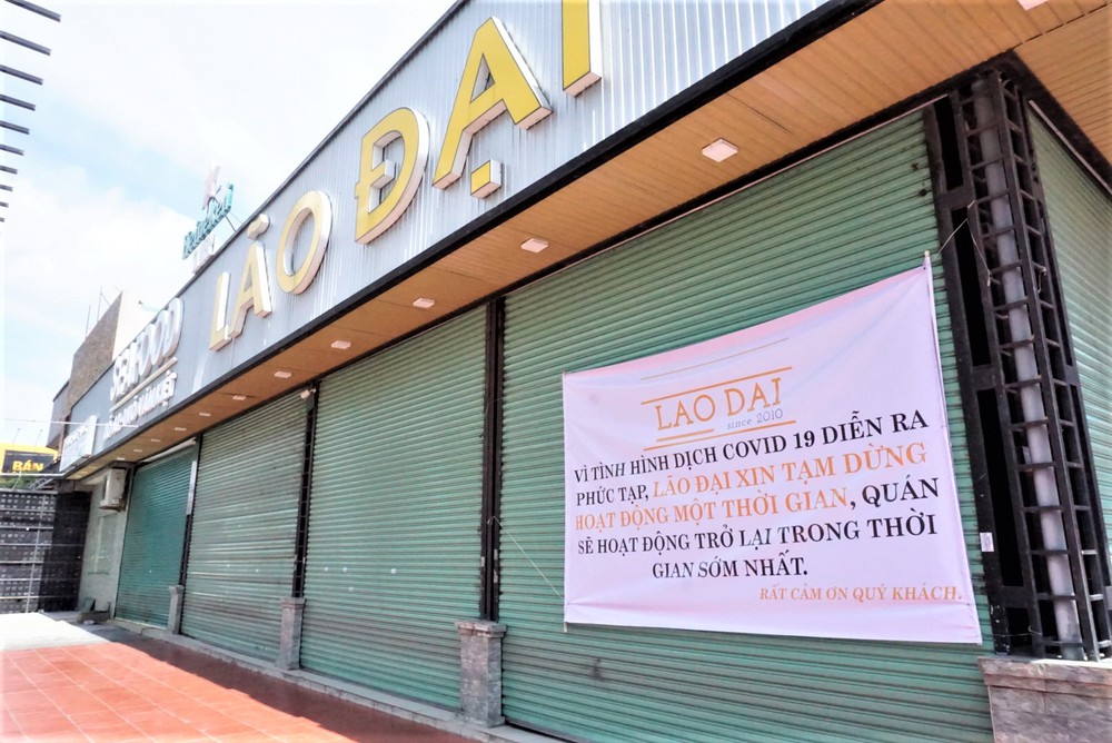 Chưa đến giờ G, nhiều hàng quán ở Đà Nẵng đã chủ động đóng cửa sớm để phòng dịch Covid-19 - Ảnh 1.
