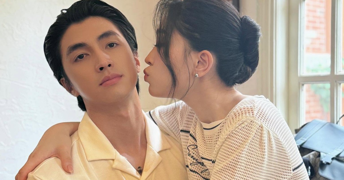 俳優ビン・アンの頬にキスする妻フォン・ガー