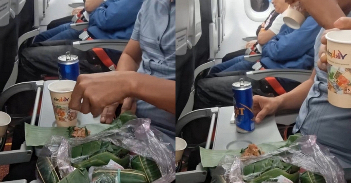 Mang cả túi nem chua, khui bia nhậu ngay trên máy bay, 2 người đàn ông gây tranh cãi dữ dội