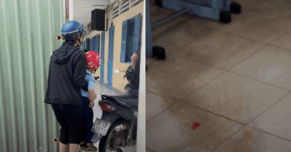 Trường học ở TP.HCM ngập sau mưa lớn, phụ huynh cõng con vào lớp