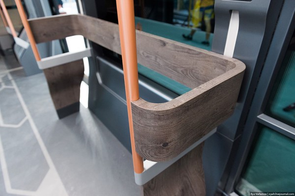 a-closer-look-at-the-wooden-handrails-aluminum-poles-and-linoleum-floors-c36df