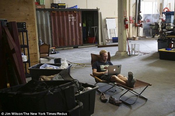 2D88C76700000578-3277963-Resident_Adam_Katz_relaxes_on_lawn_furniture_outside_his_home_in-a-3_1445207323949-b08a9